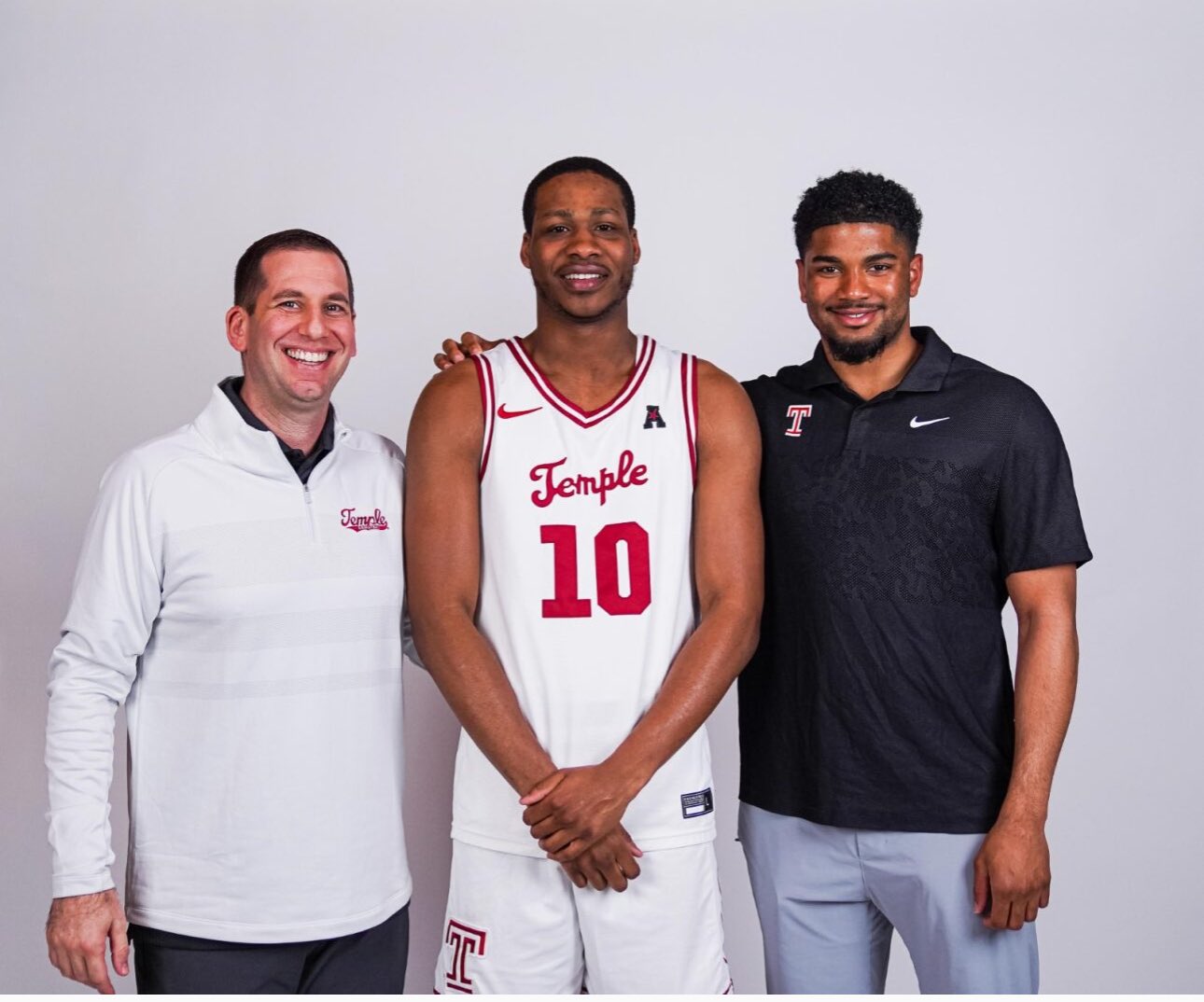 Temple coach Adam Fisher (left) got a commitment from Jameel Brown, who reunited with former teammate Camren Wynter. (Photo: Temple athletics)